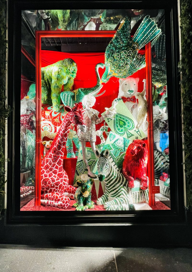 Red and green jeweled animal holiday window